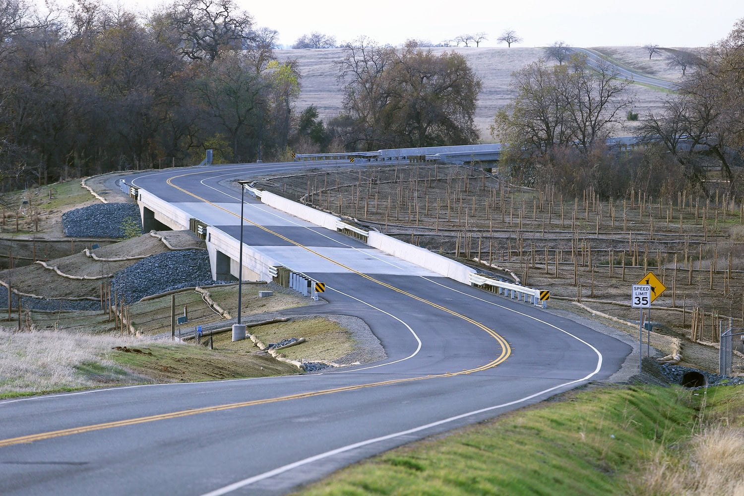 Newly replaced highway bridge and the surrounding roadway approach.