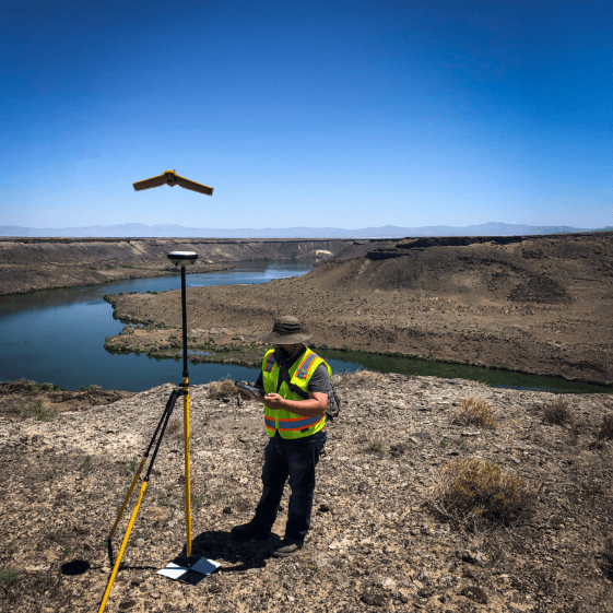 Engineer working using specialized equipment for mapping and data collection.