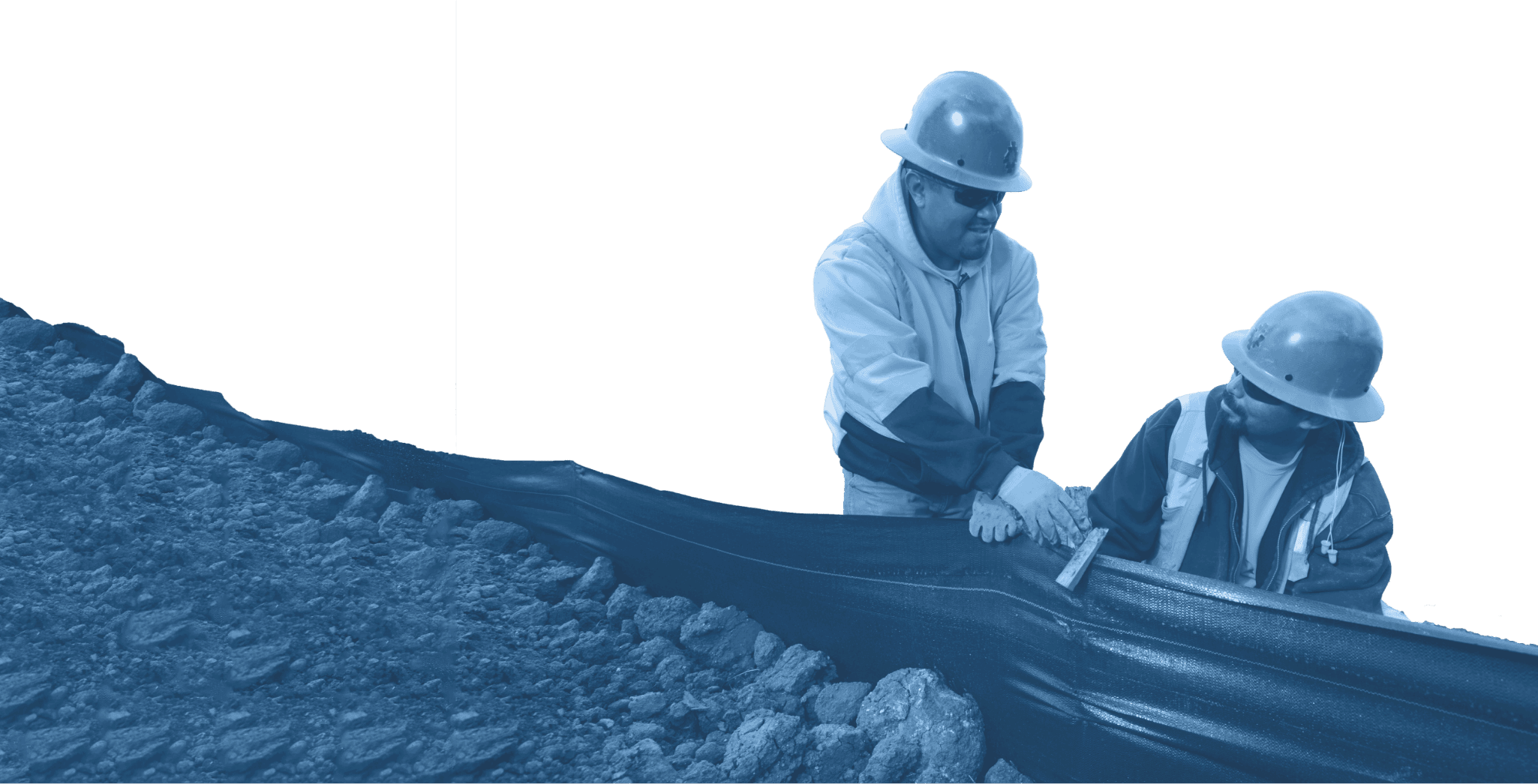 Two construction workers installing a black geotextile fabric on a rocky slope.